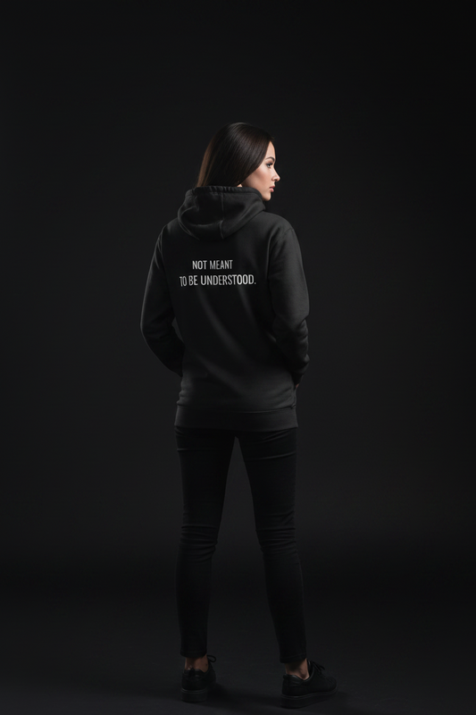 black oversized hoodie with minimal chest text "misunderstood" streetwear for overthinkers and outsiders