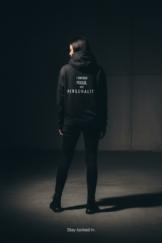 black minimalist hoodie with small chest text focus streetwear for overthinkers and high awareness mindset
