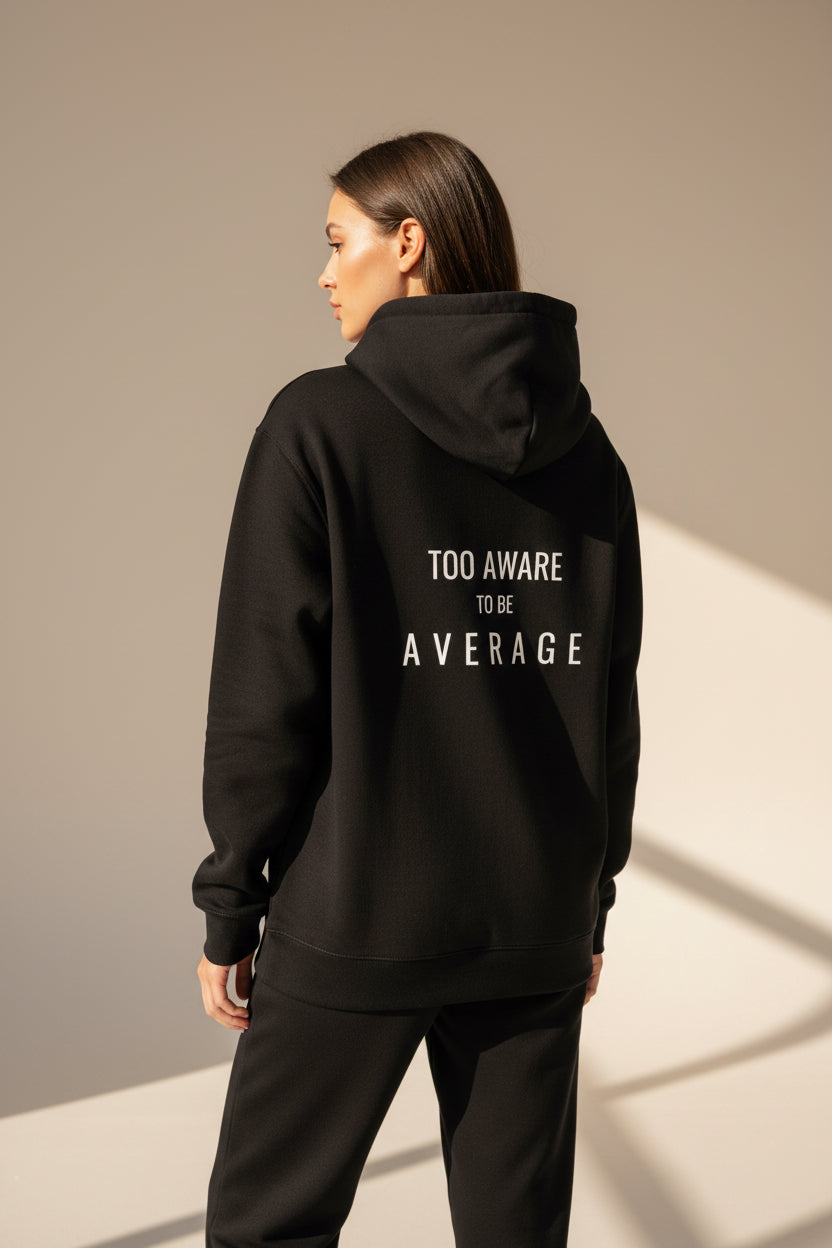 Minimal premium black AWERE hoodie studio photoshoot